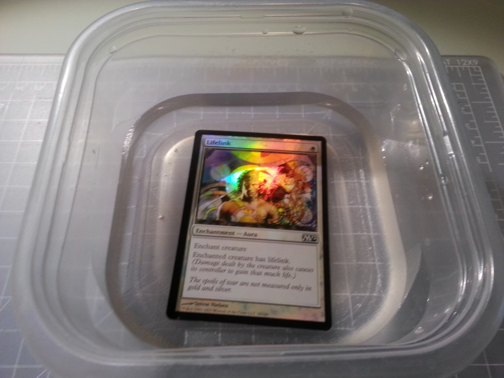 The card submerged in water.
